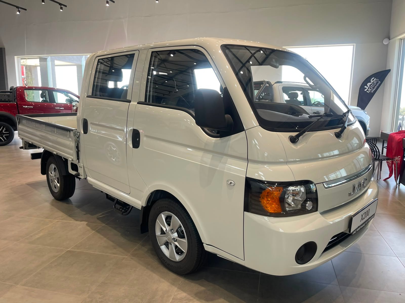White light van in showroom
